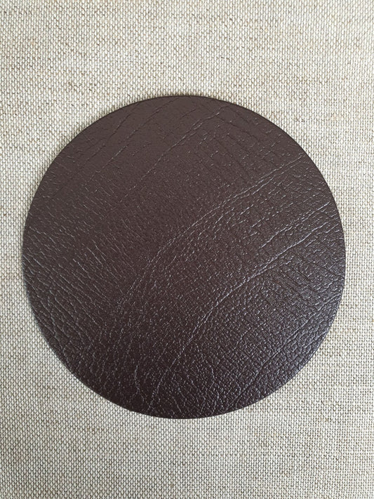 Bruine onderzetter van gebonden leer 10cm rond (Sale Item)